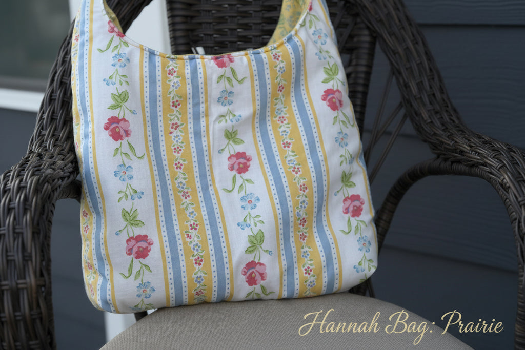 Floral and striped fabric bag on a chair